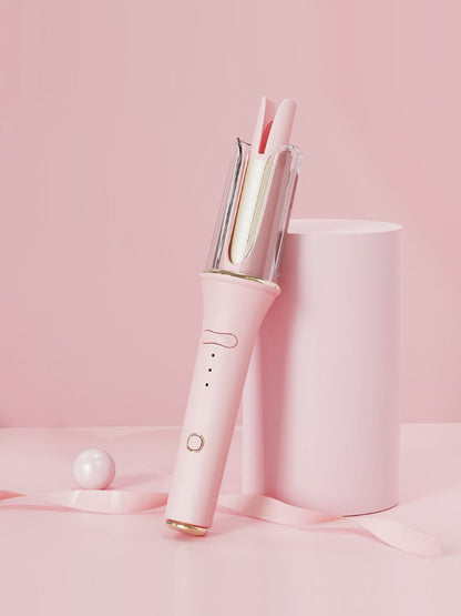 Blush pink automatic rotating ceramic hair curling iron with European plug for easy styling by Trendsi
