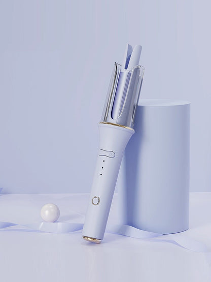 Blush pink automatic rotating ceramic hair curling iron with European plug for effortless styling, by Trendsi.