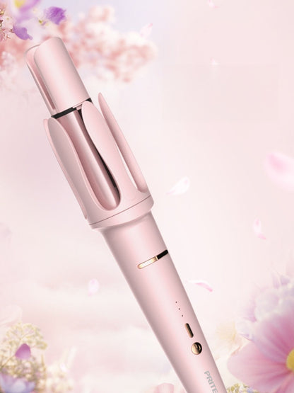 Blush pink automatic rotating hair curling iron with European plug by Trendsi, showcasing its sleek design and curling barrel.