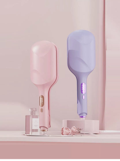 Blush pink Trendsi fast heating curling iron with European plug, showing its sleek design and ceramic barrel for smooth curls.