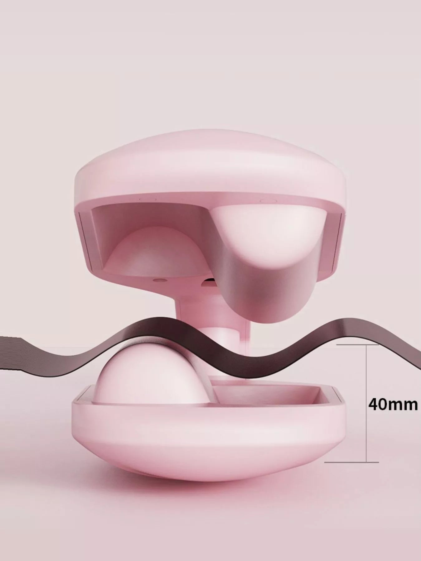 Blush pink Trendsi fast heating curling iron with European plug, showing the barrel and handle for easy styling.