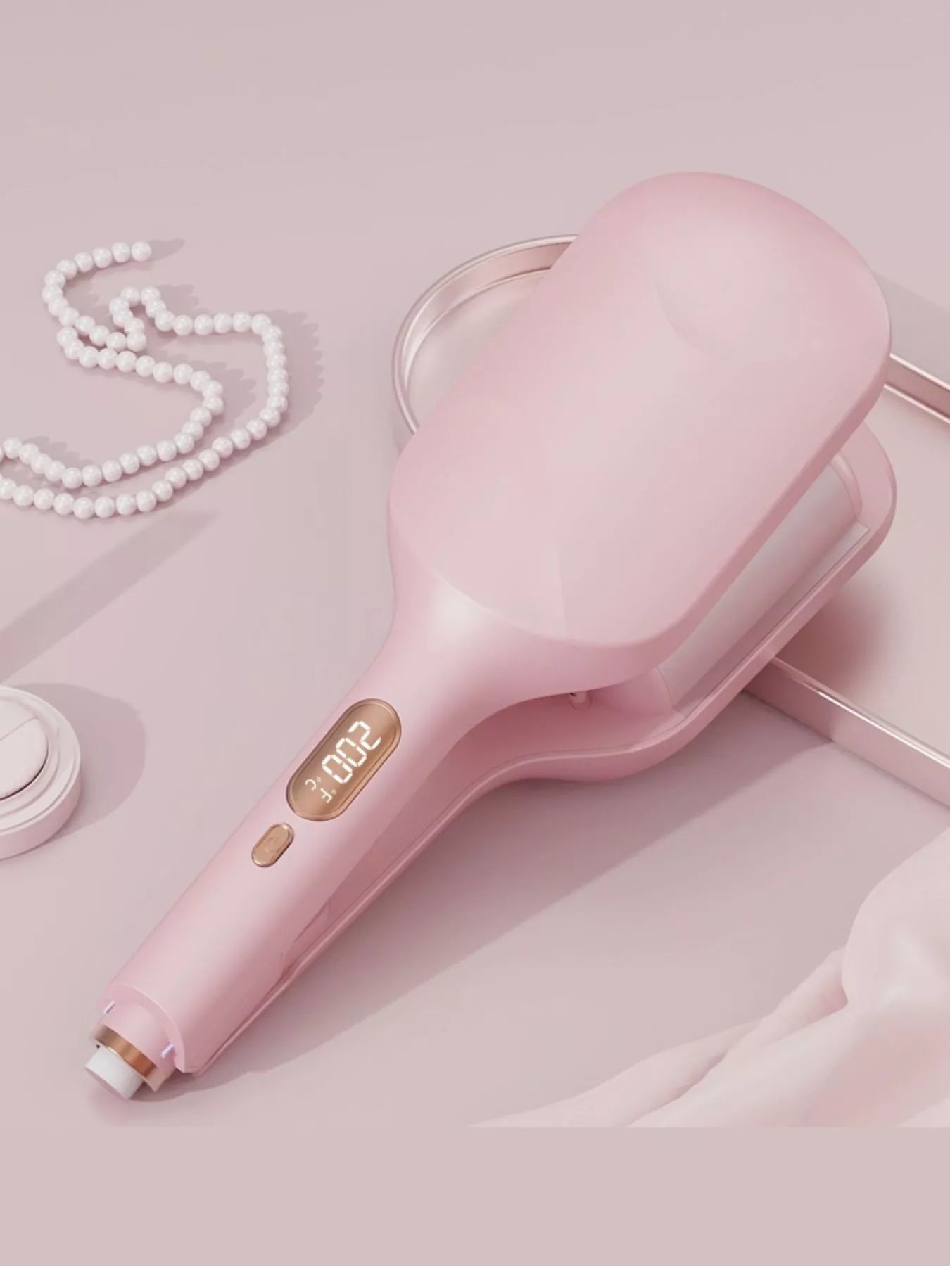 Blush pink Trendsi fast heating curling iron with European plug, showcasing a sleek design and adjustable temperature controls.