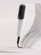 Blush pink Trendsi fast heating straightening comb with European plug, designed for quick hair styling.