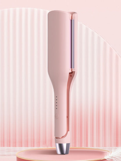 Blush pink Trendsi rotating ceramic hair curling iron with European plug for creating curls and waves.