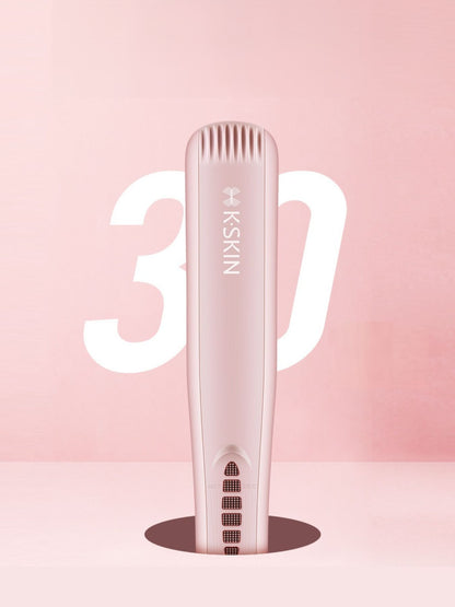 Blush pink Trendsi heated hair straightening comb with North American plug, showcasing smooth teeth and ergonomic handle.