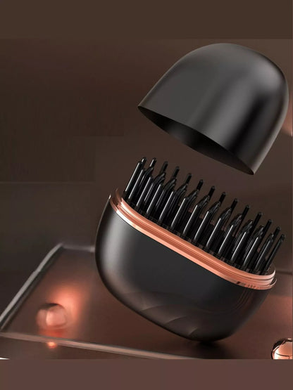 Blush pink portable hair straightening comb by Trendsi, compact design for easy styling and hair smoothing on the go.