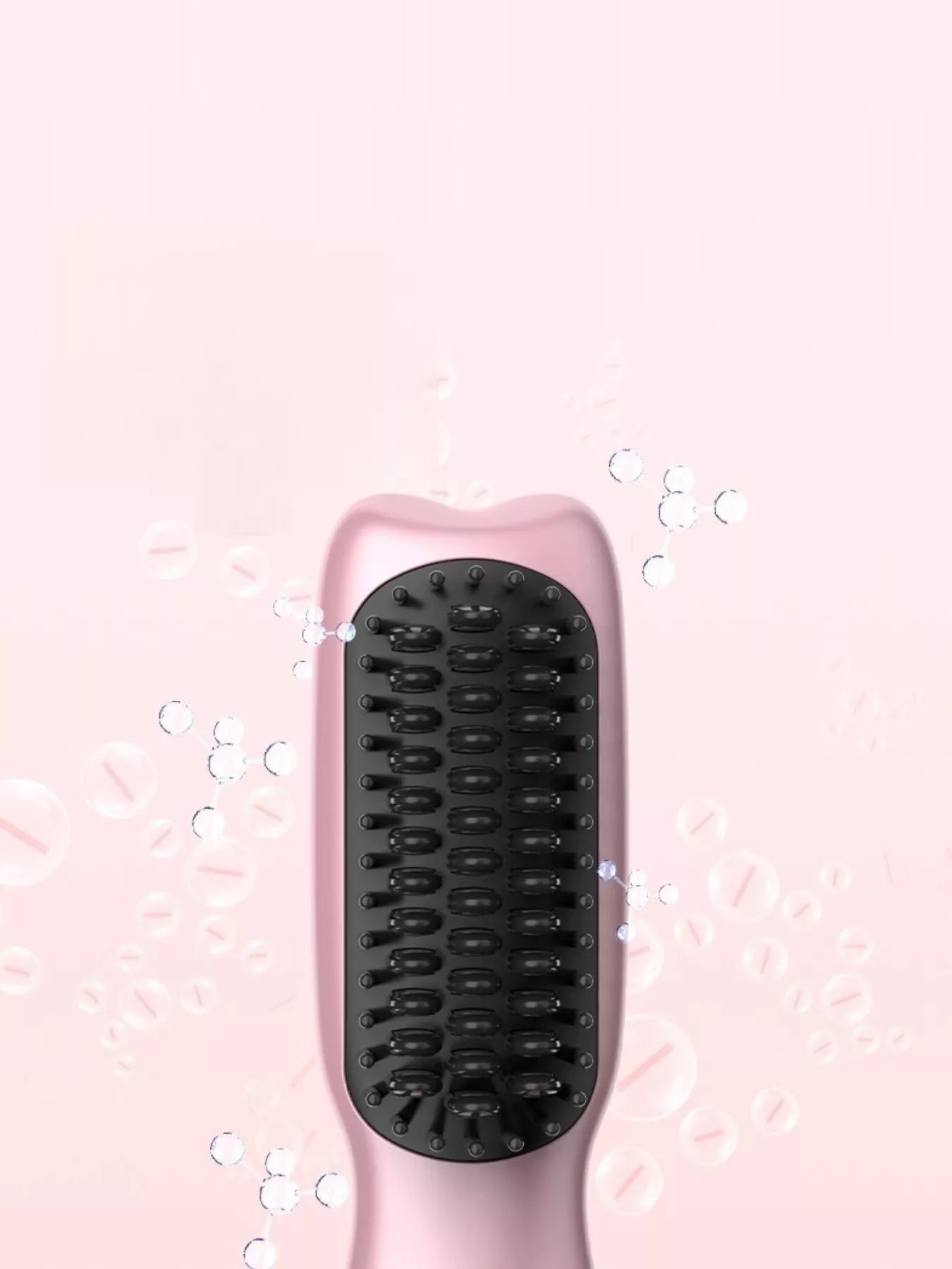 Blush pink portable heated hair straightening comb by Trendsi, compact and easy to use for sleek hair styling.