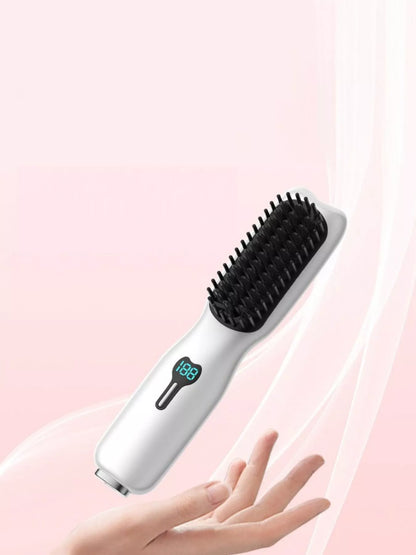 Blush pink portable heated hair straightening comb by Trendsi, compact design for easy styling and hair straightening on the go.