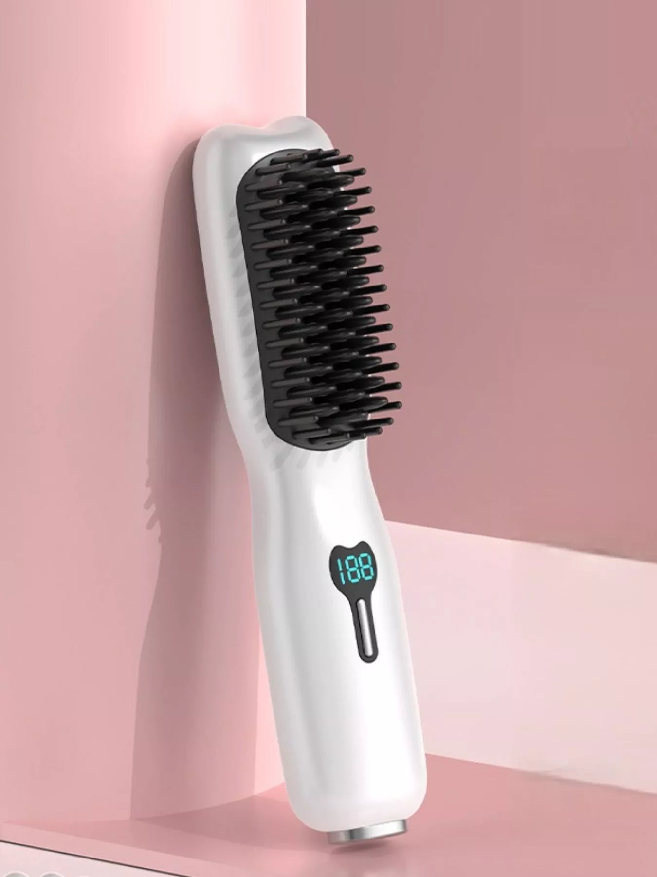 Blush pink portable heated hair straightening comb by Trendsi with one-size design and ceramic plates for sleek styling.