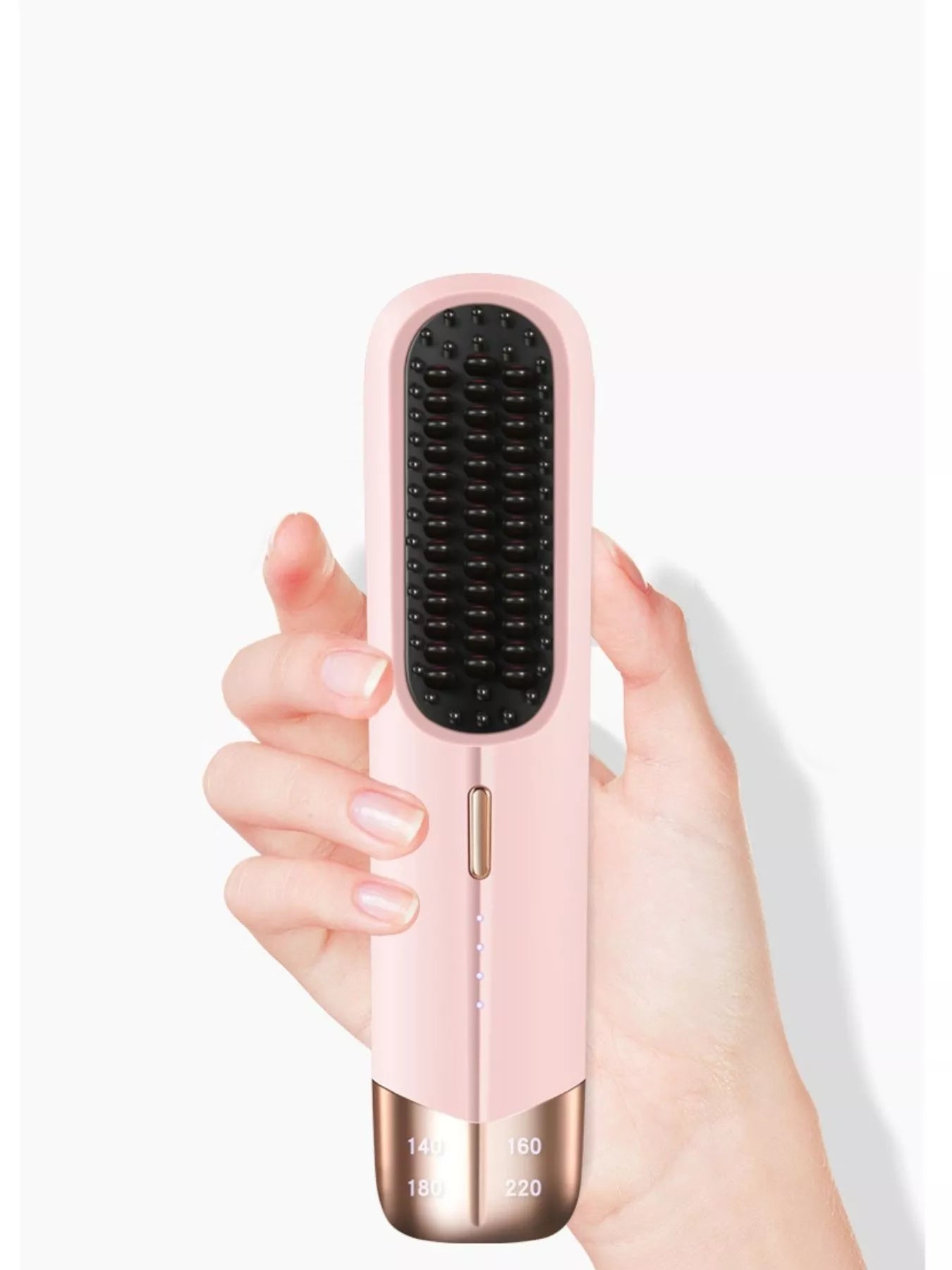 Blush pink portable wireless ionic straightener brush by Trendsi for smooth, straight hair on the go.