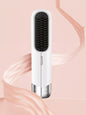 Blush pink portable wireless ionic straightener brush for hair by Trendsi, showing the compact, ergonomic design and ceramic bristles.
