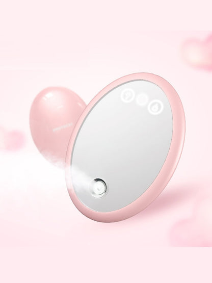 Blush pink Trendsi facial steamer beauty device, compact and sleek, with a water reservoir and steam outlet for skincare.