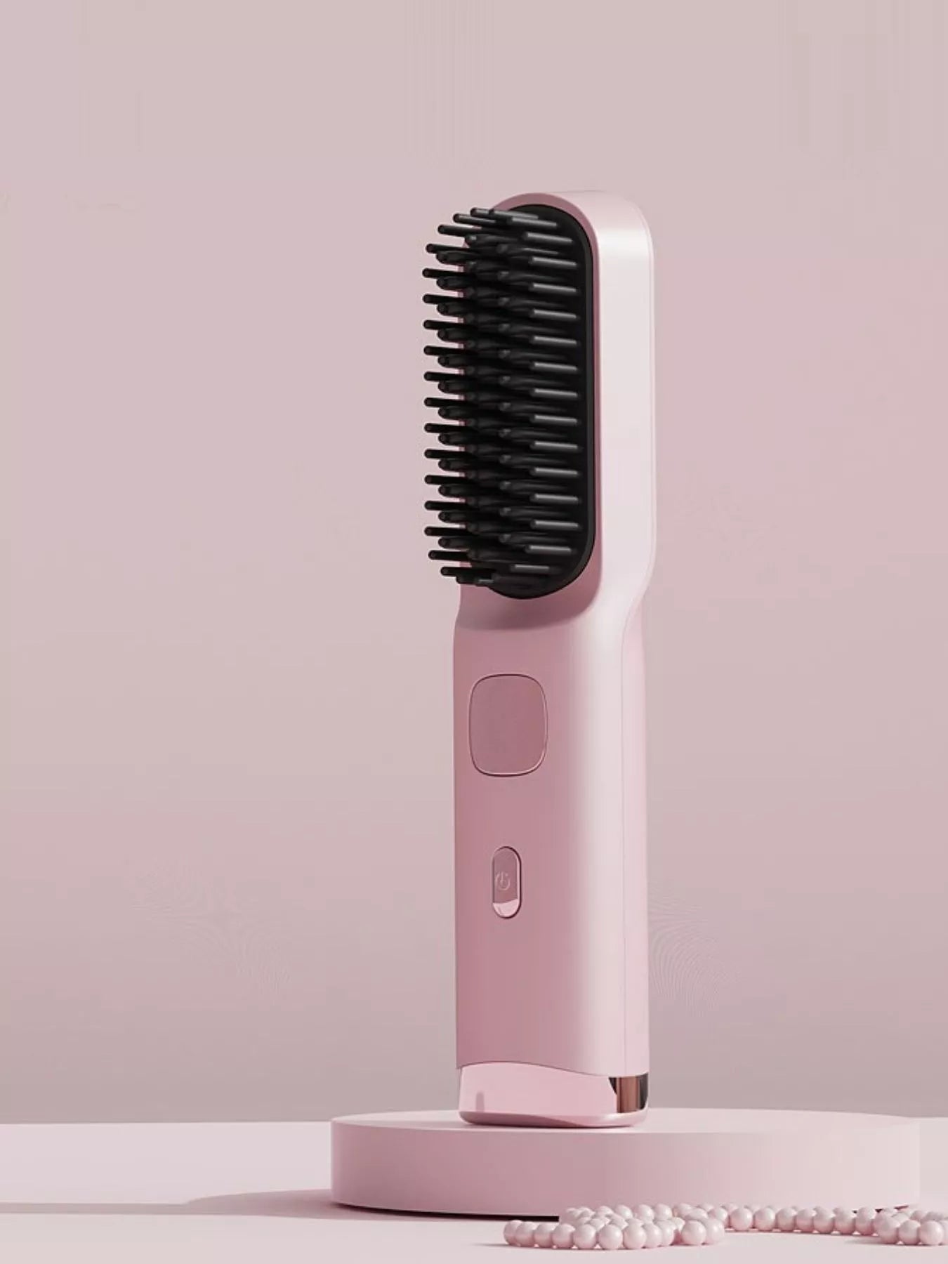 Pink heated straightening comb by Trendsi, designed for smooth, straight hair with adjustable temperature settings.