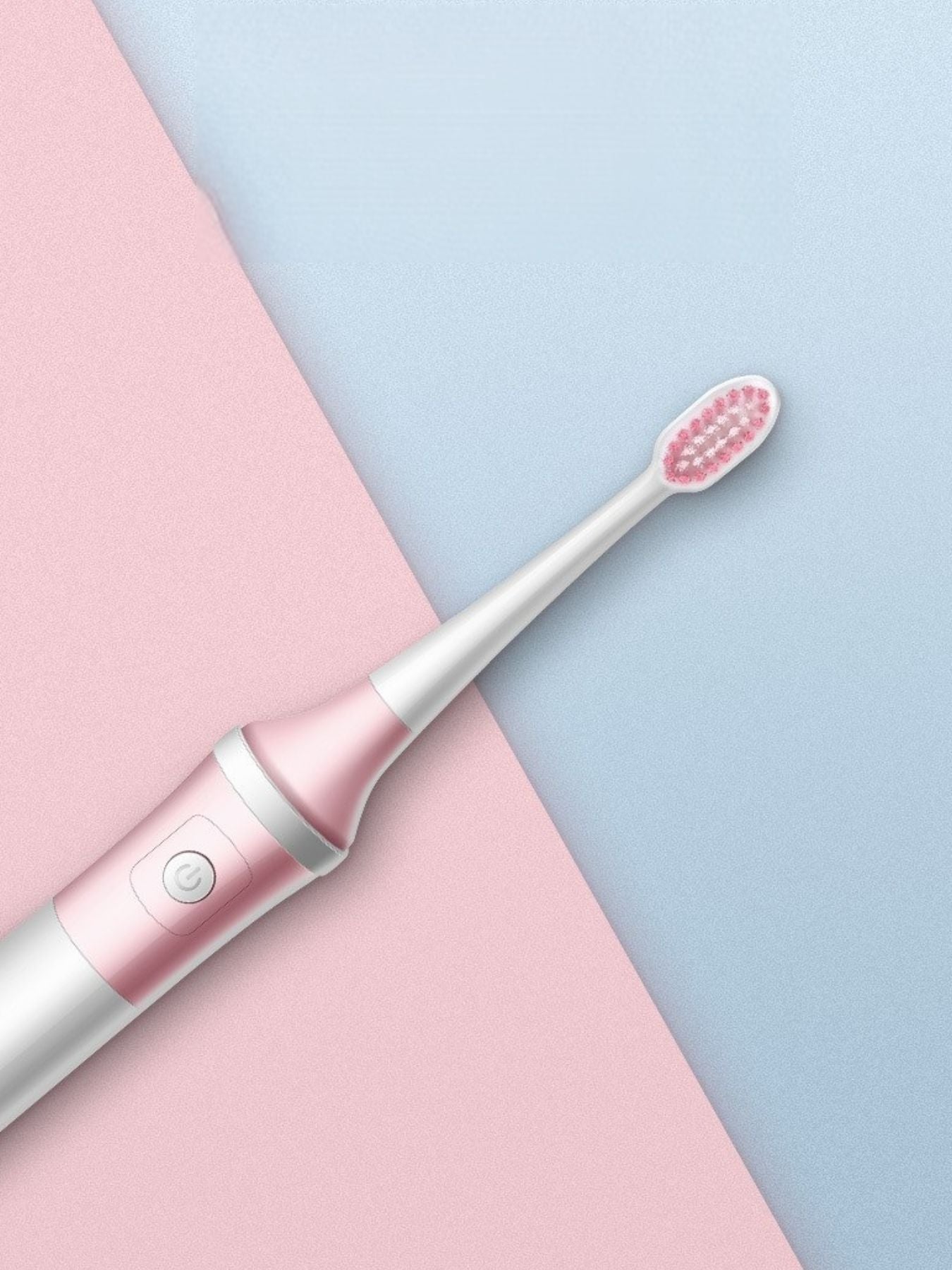 Blush pink electric toothbrush by Trendsi with multiple cleaning modes, featuring a sleek design and interchangeable brush heads.