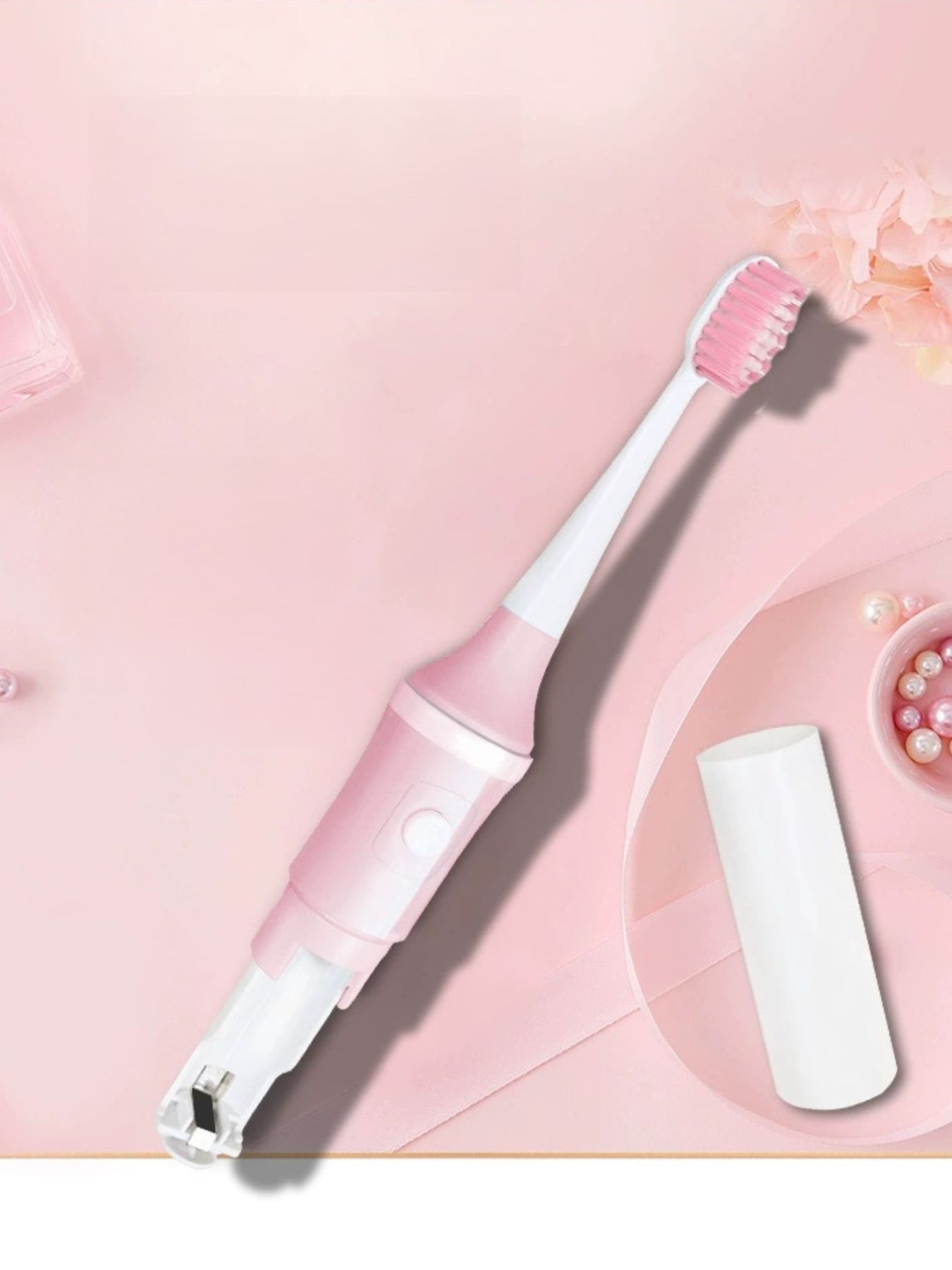 Blush pink electric toothbrush with multiple cleaning modes from Trendsi, featuring a sleek design and interchangeable brush heads.