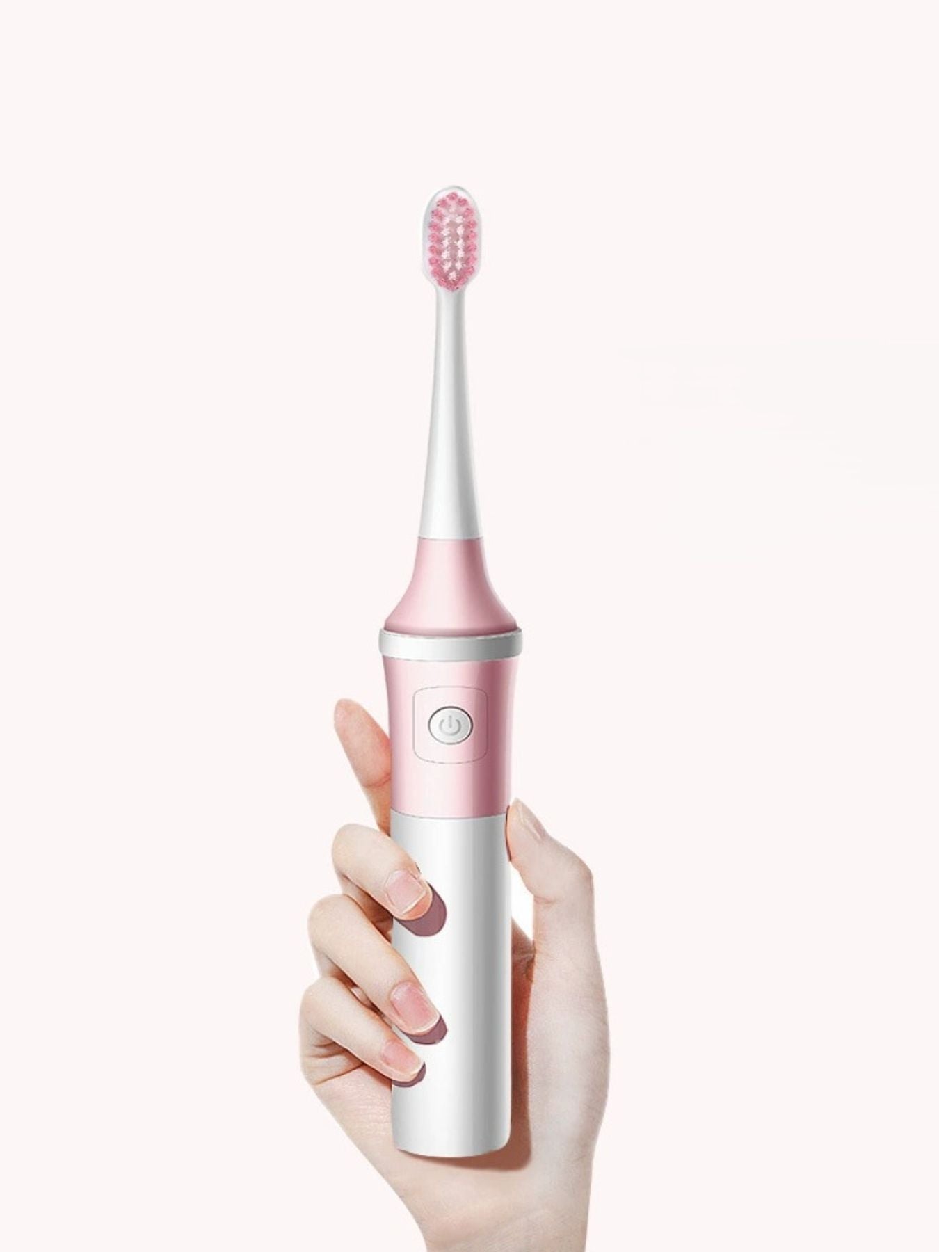 Blush pink Trendsi electric toothbrush with multiple cleaning modes and one-size design, showcasing its sleek, ergonomic shape.