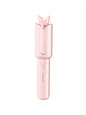 Blush pink portable curling iron by Trendsi with a sleek design and curling barrel, ideal for on-the-go styling.
