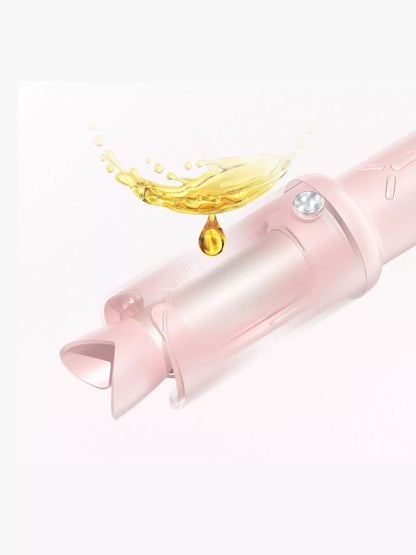 Blush pink Trendsi portable curling iron with a compact design and ergonomic handle, perfect for on-the-go styling.