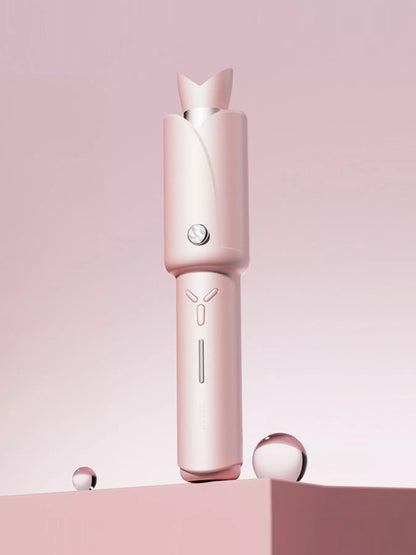 Trendsi blush pink portable curling iron with a compact design and digital temperature control for easy styling on the go.