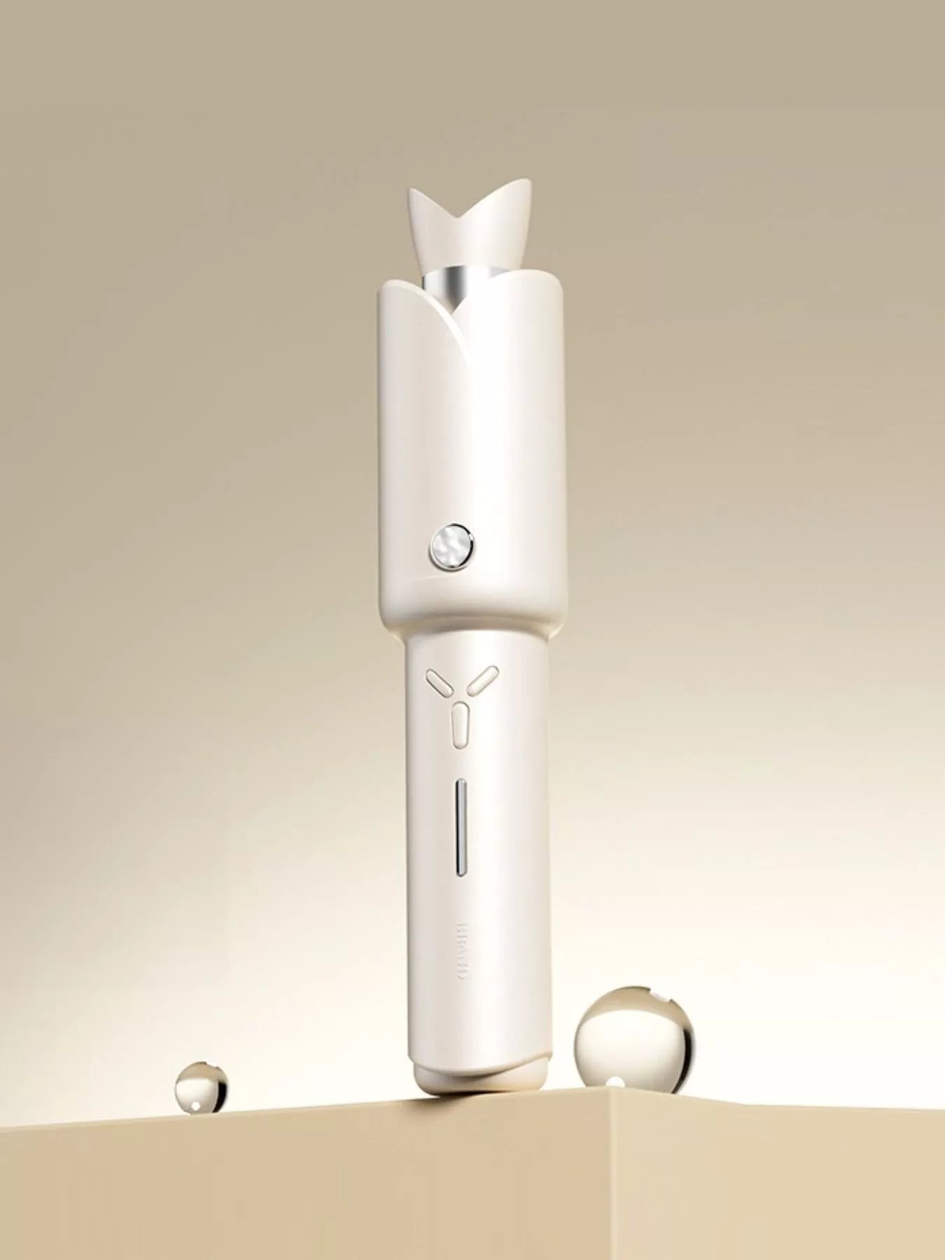 Blush pink portable curling iron from Trendsi with a compact design and ergonomic handle, ideal for quick styling on the go.