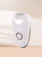 Blush pink portable hair removal epilator from Trendsi, compact and one-size, with multiple attachments for easy at-home use.