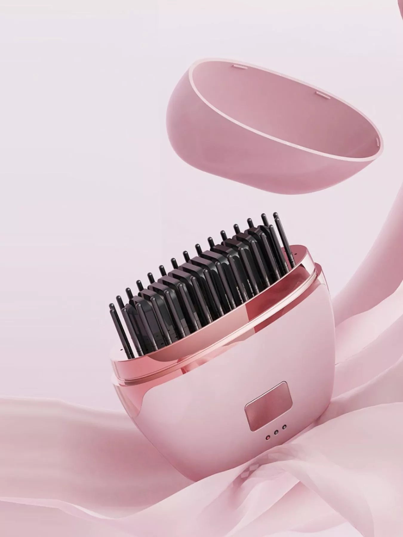 Blush pink portable heated hair straightening comb by Trendsi, compact design for easy styling on the go.
