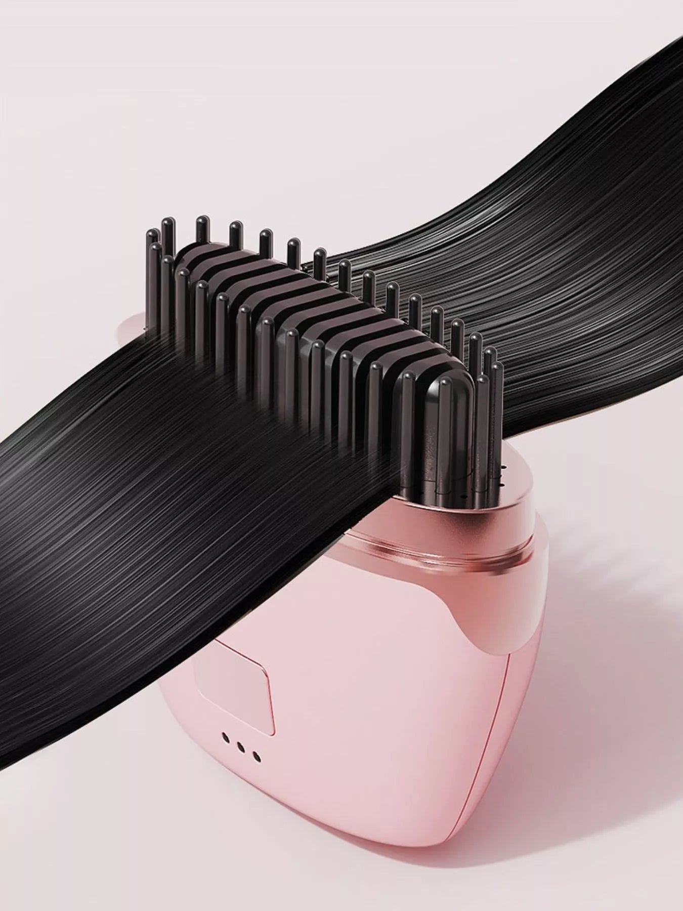 Blush pink portable heated hair straightening comb by Trendsi, compact design for easy styling and hair smoothing.
