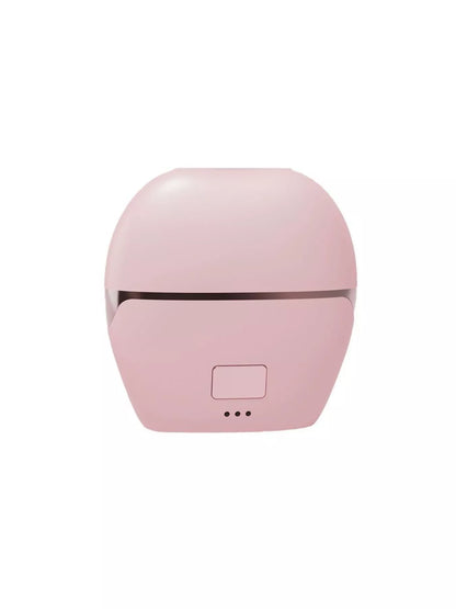 Blush pink portable heated hair straightening comb by Trendsi, compact and ergonomic for quick, easy styling on the go.