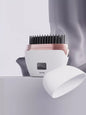 Pink portable heated hair straightening comb by Trendsi, showing the compact design and heating plates for easy styling.