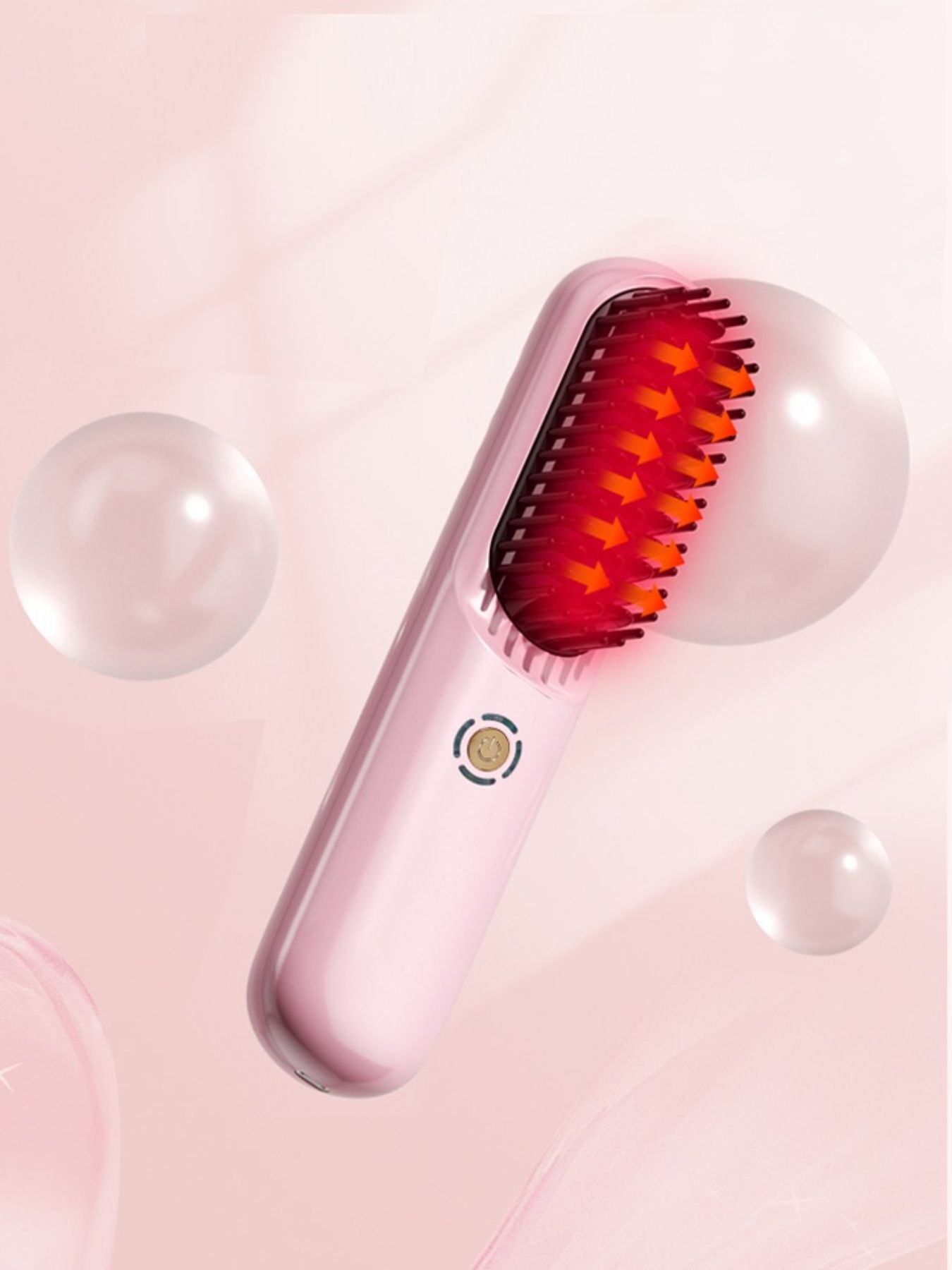 Blush pink portable heated hair straightening comb by Trendsi, featuring a compact design for easy styling on the go.