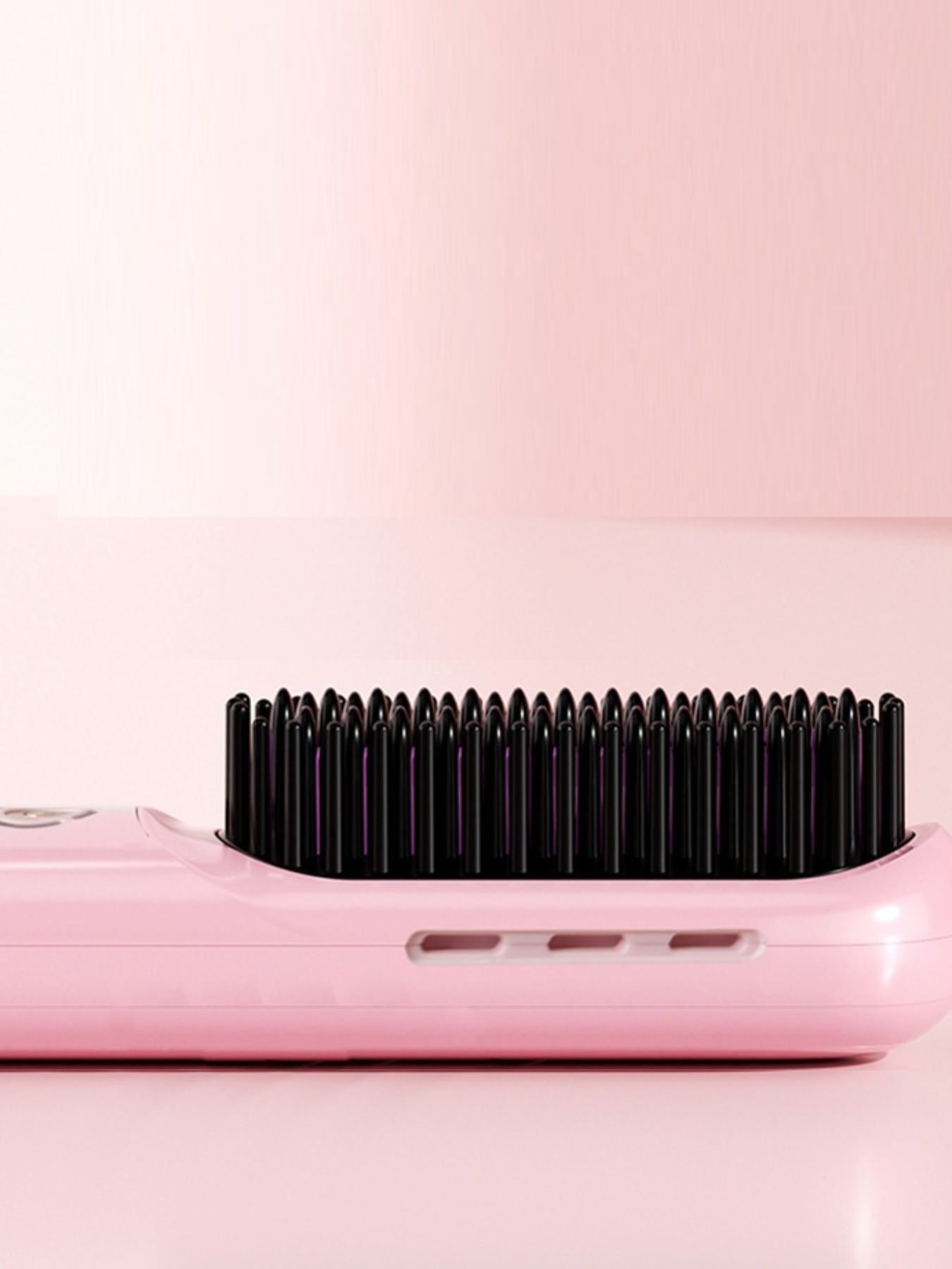 Blush pink portable heated hair straightening comb by Trendsi, compact design with ceramic heating for smooth, straight hair.