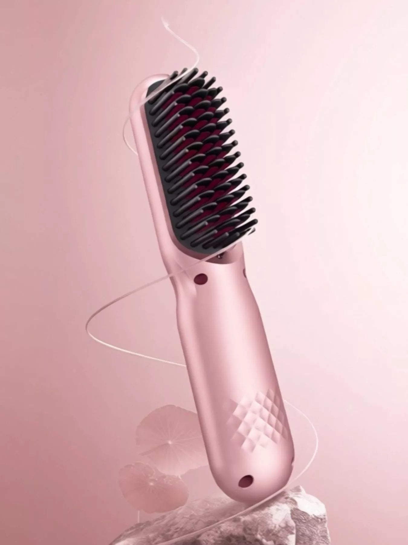 Blush pink portable heated straightening comb by Trendsi, compact design for easy hair styling and straightening.