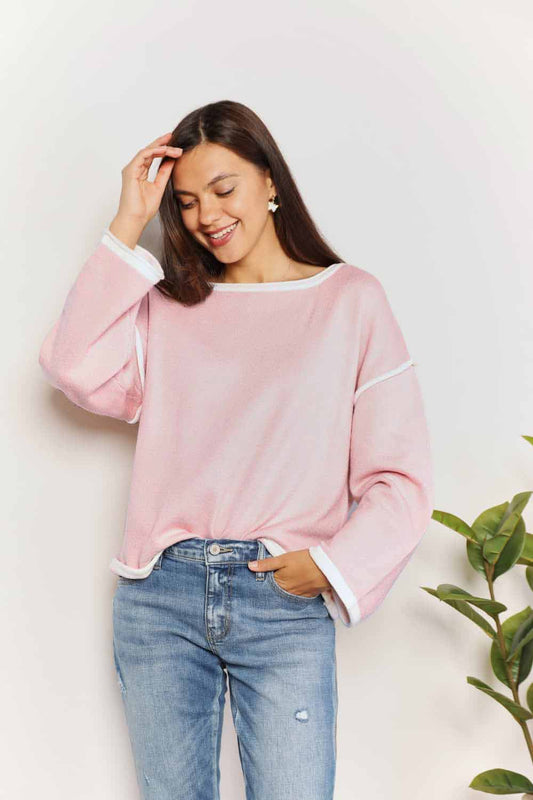 Blush pink knit top with angel wing contrast detail and dropped shoulder design by Trendsi.