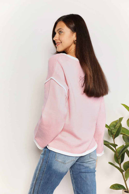 Blush pink angel wings contrast detail dropped shoulder knit top by Trendsi, featuring a relaxed fit and stylish design.