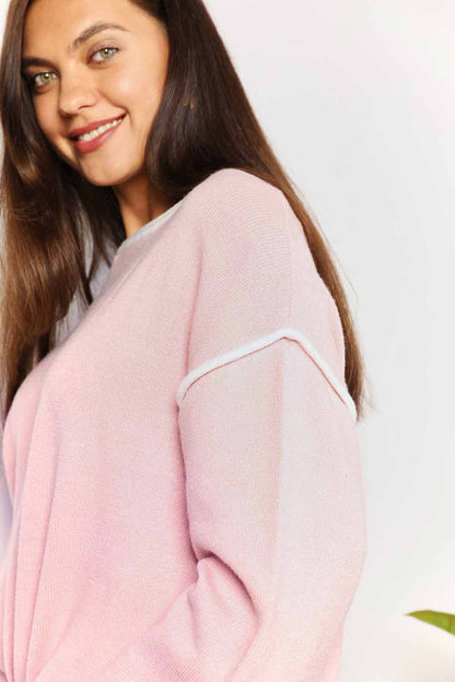 Blush pink knit top with angel wing contrast detail and dropped shoulder design, stylish Trendsi women's fashion top.