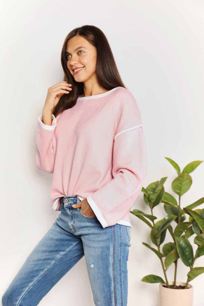 Blush pink knit top with angel wing contrast detail and dropped shoulder design by Trendsi.