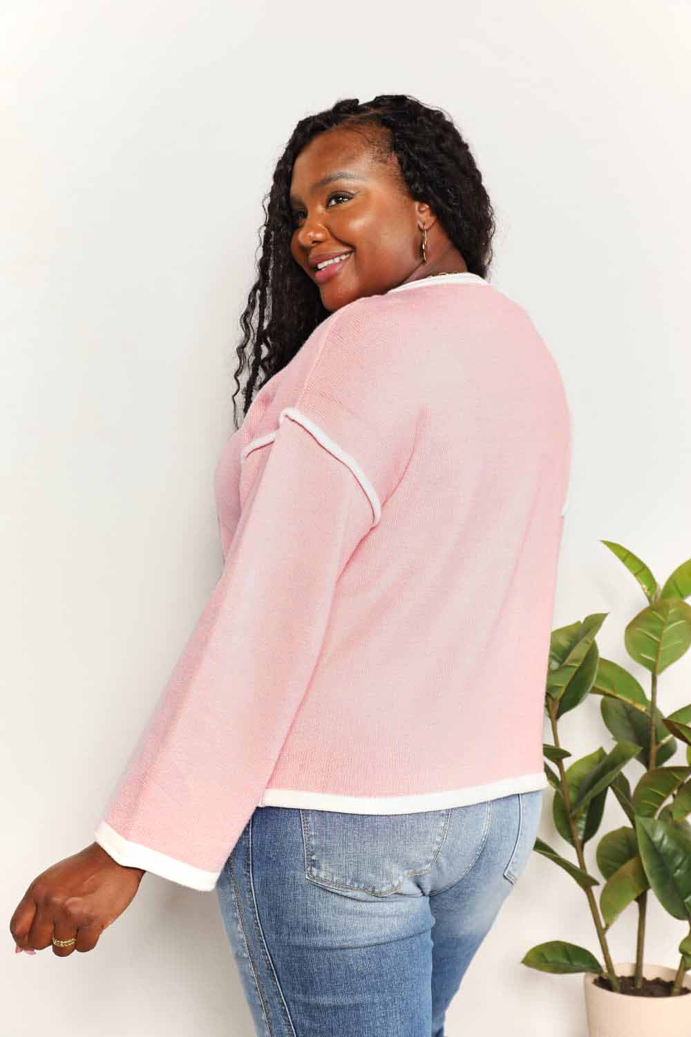 Blush pink knit top with angel wing contrast details and dropped shoulder design, stylish Trendsi women's sweater.