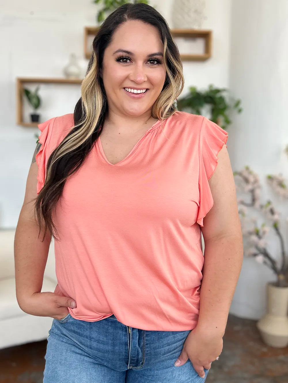 Blush pink bamboo short sleeve T-shirt with notched ruffled details, casual fit, from Trendsi's Basic Bae collection.