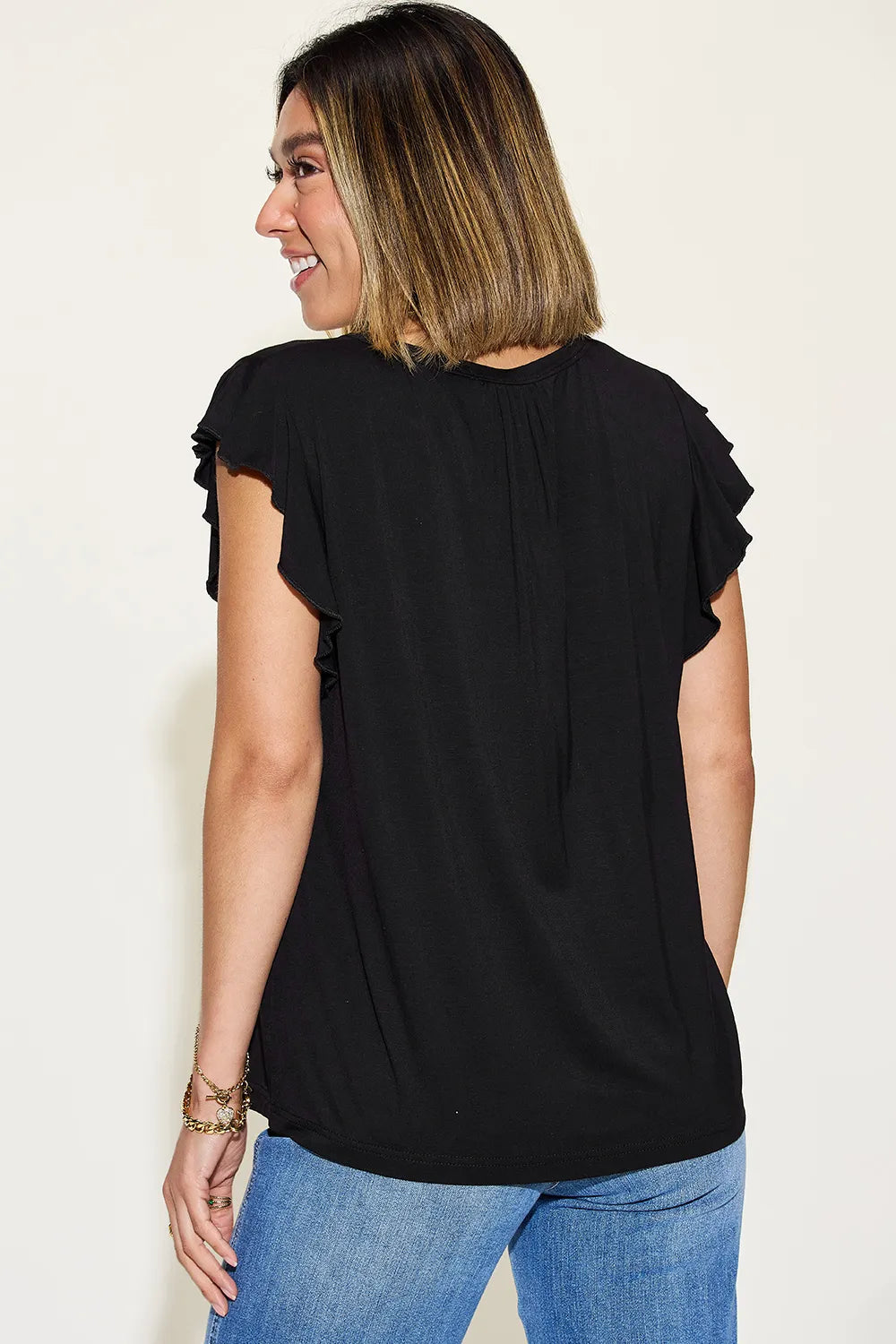 Blush pink Basic Bae bamboo short sleeve T-shirt with notched ruffled neckline, casual and comfortable for everyday wear.