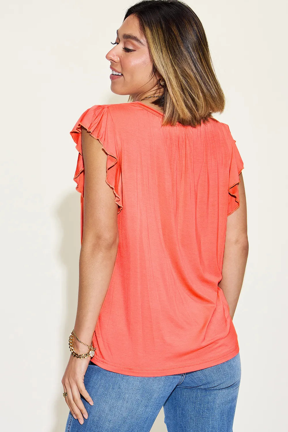 Blush pink Trendsi Basic Bae bamboo short sleeve T-shirt with notched ruffle details, full-size, lightweight and casual.