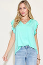 Blush pink Basic Bae bamboo short sleeve t-shirt with notched and ruffled details, casual and breathable for everyday wear.