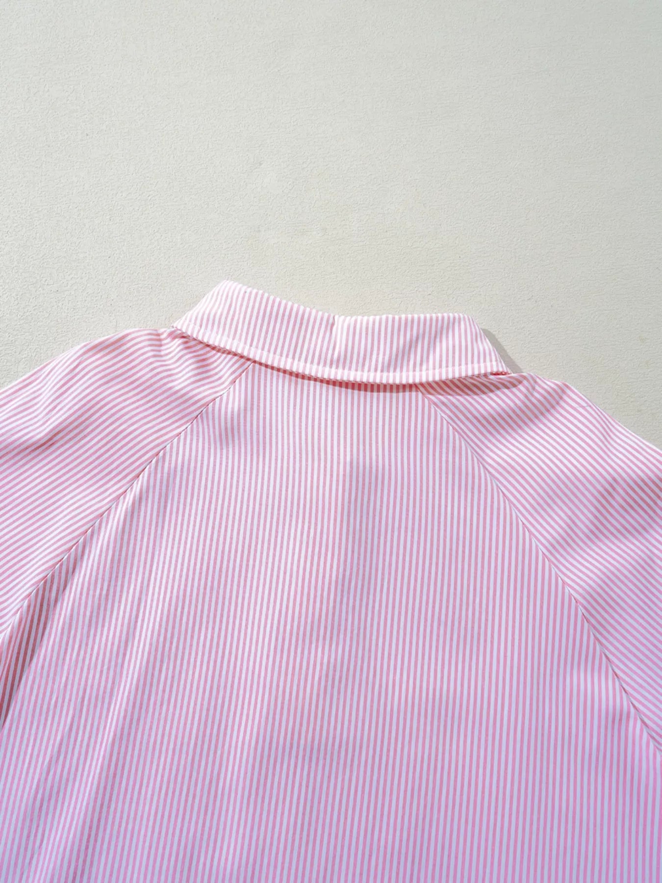 Blush pink pinstripe long sleeve blouse with smocked cuffs and button shirt collar, trendy women's shirt from Trendsi