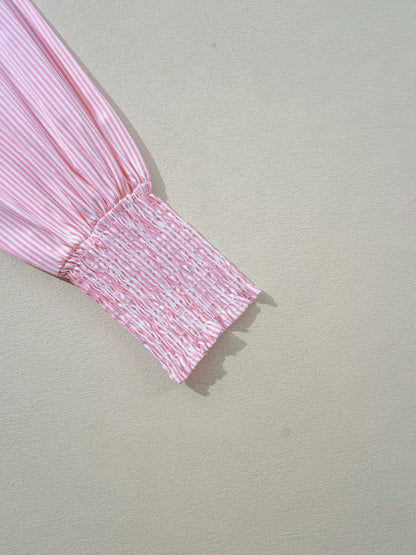 Blush pink pinstripe long sleeve blouse with smocked cuffs and button-down shirt collar, stylish Trendsi women's shirt.