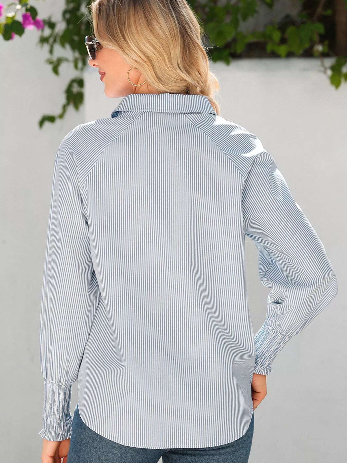 Blush pink pinstripe long sleeve blouse with smocked cuffs and button-up shirt collar, trendy Trendsi women's shirt.