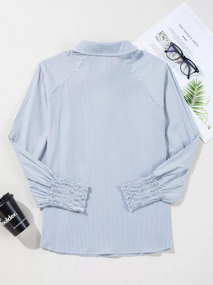 Blush pink pinstripe long sleeve blouse with smocked cuffs and button collar, stylish women’s shirt from Trendsi.