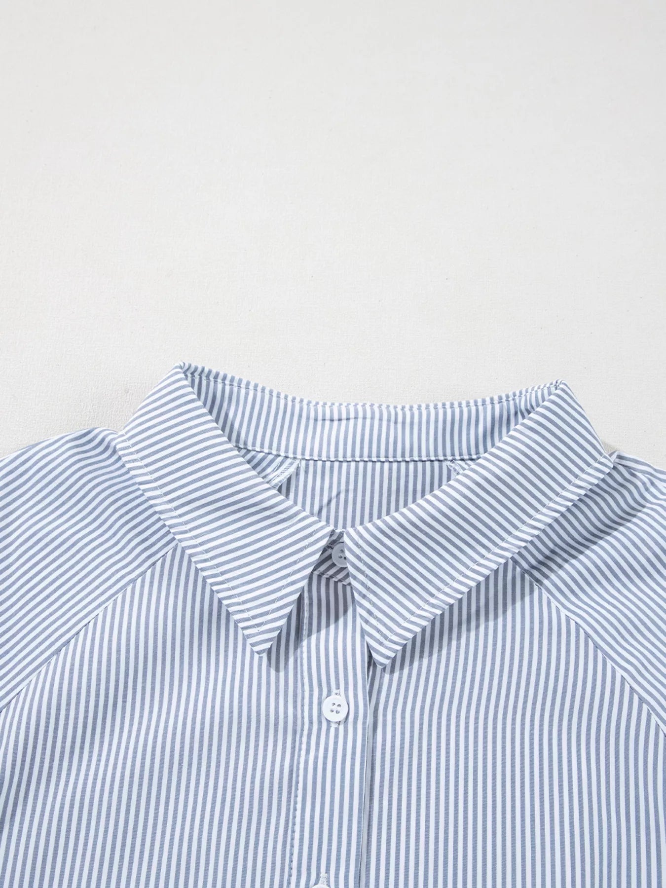 Blush pink pinstripe long sleeve blouse with smocked cuffs and button-up shirt collar, stylish Trendsi women's shirt.
