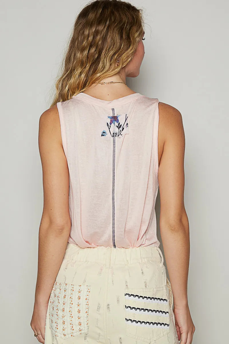 Blush pink floral detail pocket patch tank top from Trendsi, featuring a sleeveless design and relaxed fit.