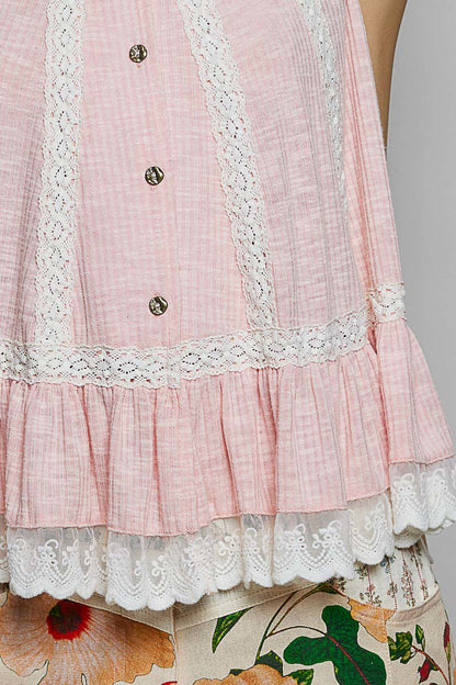 Blush pink sleeveless top with lace trim, ruffle hem, button details, and round neck from Trendsi.