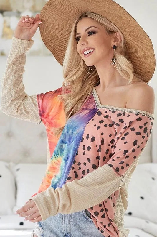 Blush BiBi print block V-neck top by Trendsi with contrast stitching, featuring a relaxed fit and stylish design.