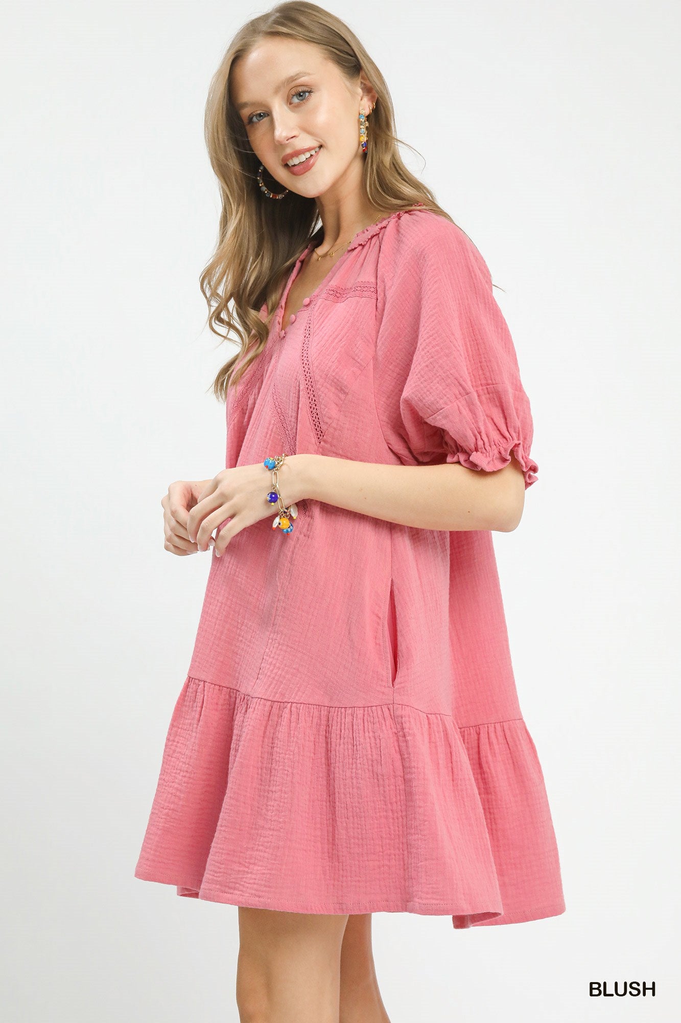 Blush pink Umgee cotton gauze mini dress by Trendsi, featuring a relaxed fit and lightweight, breathable fabric.